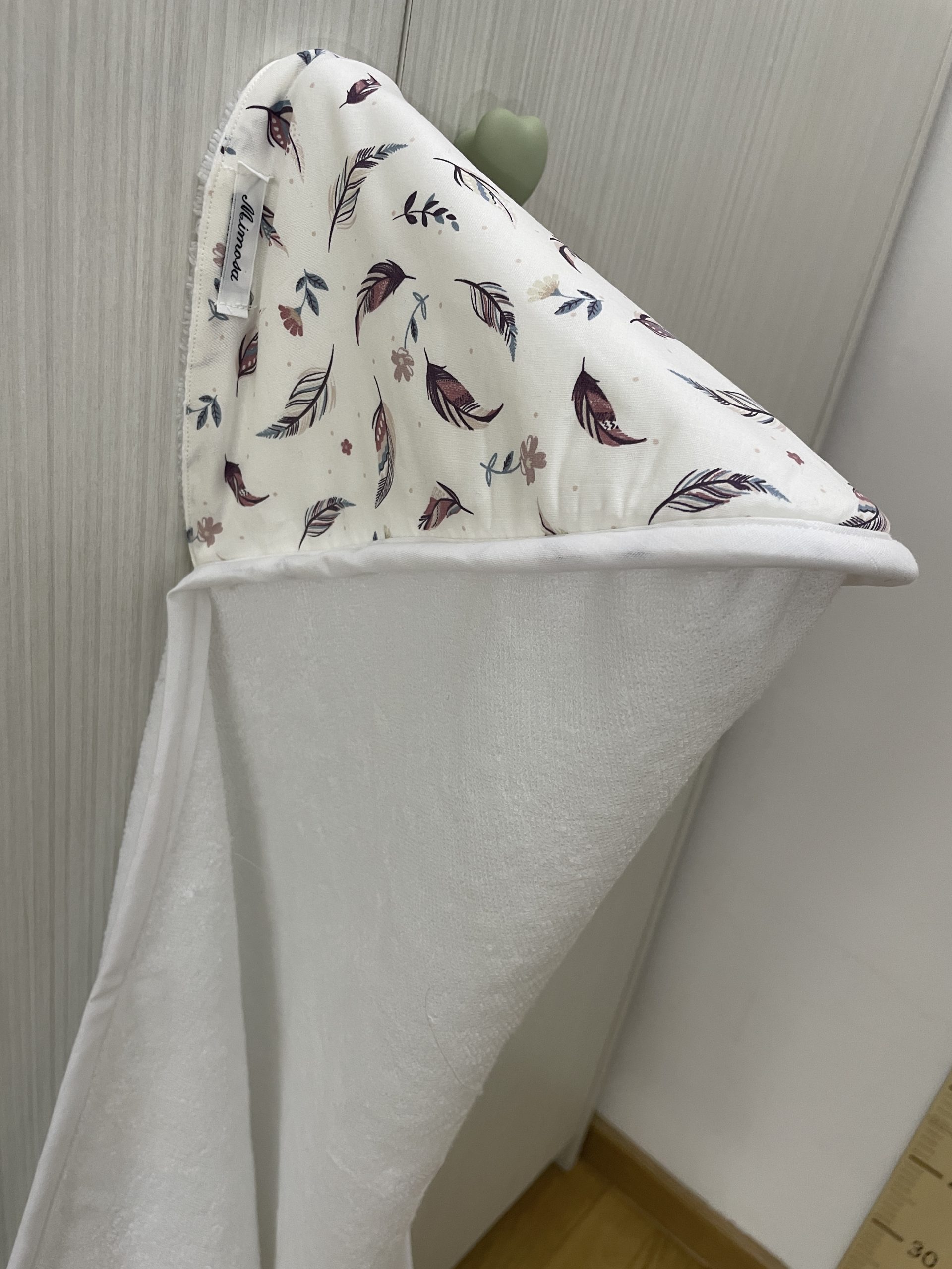 DETALLE CAPA PLUMAS 36